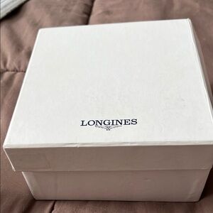 Classic designer watch in white box with paper work